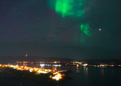 Voor anker in Kirkenes met Noorderlicht